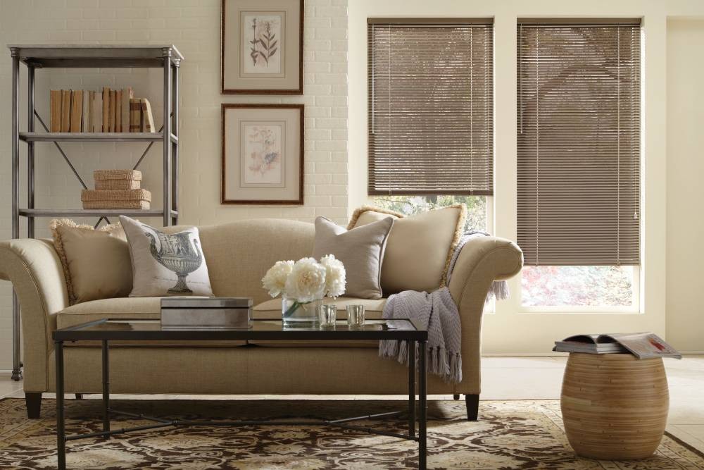 Luxurious and bright living room with two windows decorated with Hunter Douglas metal blinds near Providence, RI